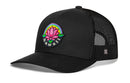 The Haka Hat Hawaii Aloha Trucker Hat is a black mesh snapback with a curved bill, featuring a colorful pink lotus and "Hawaii" patch—perfect for island vibes. Brand: Haka Hat.