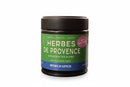 A black jar labeled World Spice Herbes de Provence with Lavender features green and blue accents and notes that it contains lavender seasoning. The brand name, World Spice, appears at the bottom, highlighting this floral herb blend.