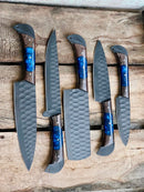 The Texan Knives 13" Forged Damascus Steel Chef Knife features a wenge wood and resin handle and includes a leather sheath. This premium knife is beautifully crafted, perfect for chefs or as a unique gift. Knife set for sale now!.