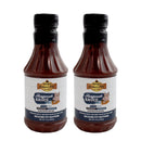 Two bottles of Hickman's BBQ Haugwaush Gluten Free Natural BBQ Sauce 19 oz - Pack of 2 by Hickman's BBQ, featuring a pig illustration on the label, gluten-free text, black caps, and a white background.