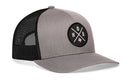 The Haka Hat Houston Trucker Hat in gray-black features a mesh back, front patch with crossed lines, HOU letters, and Texas outline. This stylish snapback by Haka Hat offers comfort for any occasion.