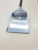 The WPPO Ash Shovel with Black Alumina Handle by WPPO LLC Direct lies flat on a light-colored surface, its shiny square blade reflecting the light—an essential tool for smoothly handling ashes in and out of your pizza oven.