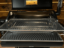 Two Green Mountain Grills Peak / Jim Bowie | Pimp My Grill® Gen2 Slide-Out Rack System metal grilling racks installed inside a pellet smoker to increase cooking space.