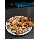 A plate of chicken strips seasoned with BuffalowBBQ Signature Blend BBQ Rub.