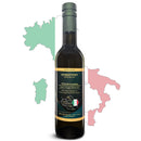 A bottle of Georgetown Olive Oil Co. Coratina (ITALY) Extra Virgin Olive Oil is positioned in front of a green, white, and red outline of Italy. The label emphasizes its high polyphenol content and single-origin Italian olive oil made from first cold pressed olives.