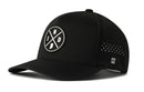The Haka Hat Indiana Performance 5-Panel Hat | IND X Flexfit® Snapback is a black hat with a curved brim, circular white "I N D" logo on the front, and side ventilation—perfect for Indiana fans seeking premium style and comfort.