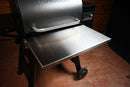 Pimp My Grill® Tactical Stainless Folding Front Shelf attached to a pellet grill as a convenient stainless steel prep station.