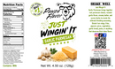 Product label for Pawpa Flavor Just Wingin’ It Garlic Parmesan seasoning featuring a nutrition facts panel, a bear logo, images of fresh garlic and parmesan cheese powder, and a QR code with social media icons.