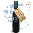 A bottle of Georgetown Olive Oil Co. Koroneiki (GREECE) Extra Virgin Olive Oil stands proudly, adorned with an award tag, in front of a faded Greek flag and map. Text highlights its recognition at 20 international competitions and a total of 27 awards.