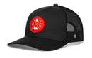 The Haka Hat Kansas City Trucker Hat | Red Gold KC X features a black snapback with a red circular patch showcasing yellow crossed lines, white state outlines, and the letters K and C. Black mesh panels at the back provide breathability.