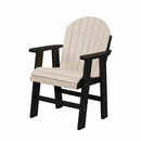 The Kanyon Living Poly Lumber Fixed Dining Height Chair in Seashell & Black features a light natural wood-look seat and backrest with black armrests and legs, creating a stylish coastal patio chair perfect for outdoor relaxation.