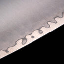 Close-up of the Messermeister Kawashima Chef's Knife - 8" blade, featuring a wavy hamon pattern that highlights the contrast between polished and etched high-carbon stainless steel.