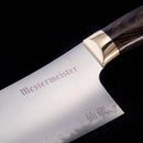 Close-up of the Messermeister Kawashima Chef's Knife - 8" blade, engraved with Messermeister and Japanese characters, crafted from high-carbon stainless steel with a polished bolster and ergonomic dark wooden handle.