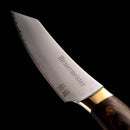 A close-up of the Messermeister Kawashima Paring Knife - 3.5" shows its wooden handle, gold bolster, and sharp SG2 powdered steel patterned blade, all set against a black background.