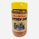 A clear plastic spice jar with a yellow lid labeled Culture Hot Sauce Kitchen Sink Rub. The label features a kitchen sink filled with vegetables and utensils. Inside, you'll find 170g (6oz) of this all-in-one spice blend from Culture Hot Sauce—a versatile BBQ seasoning perfect for any dish.