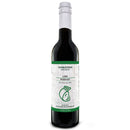 A dark glass bottle labeled Georgetown Olive Oil Co. Mediterranean Lamb Marinade features rosemary, lime, and mint, with green accents and a small olive illustration on the label. This refreshing marinade captures the vibrant flavors of the Mediterranean in every drop. The bottle contains 375 ml (12.7 fl oz).
