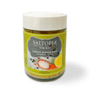 The SALTOPIA Infused Sea Salts Citrus Lovers Gift Set features zesty citrus-infused sea salts, perfect for finishing dishes. Includes premium blends in a 6 oz jar with a vibrant label showing salt, peppercorns, and lemon slices.