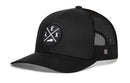 The Haka Hat Lexington Trucker Hat is a black snapback with mesh back and a round front patch showing crossed lines, the letters L, E, X, and a small graphic.