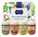 SALTOPIA Infused Sea Salts presents the Saltopia Low Sodium Seasonings gift set—four jars (Italian, Mothers, Lemon & Herbs, Southwestern) in front of a vibrant veggie box. All labeled Sing With Flavor—perfect for low sodium cooking.