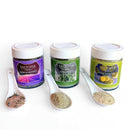 The SALTOPIA Mediterranean Kitchen Gift Set features three infused sea salts—Herbs de Provence, Rosemary Salt, and Lemon Thyme Salt—with white ceramic spoons offering samples of each flavorful blend.