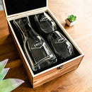 The Wine Decanter - The Diamond set includes an engraved decanter and two stemless wine glasses, each featuring a name and geometric design, presented in a wooden gift box.