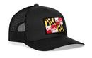 The Haka Hat Maryland Flag Trucker Hat features a black mesh design, a Maryland flag patch on the front, and an adjustable snapback for comfort.
