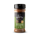 A bottle of Texan Heartland Master Blend All-Purpose Seasoning from the Texan Heartland brand, topped with a black lid and adorned with a green and black label showcasing herbs and seasoning powder—ideal for grilling and delivering bold Texas-style flavor to any dish.