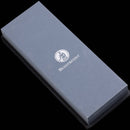 The Messermeister Restoration Stone - 400 & 1000 Grit features a rectangular blue design with the Messermeister logo on top, ideal for precise knife sharpening, and is shown against a plain background.