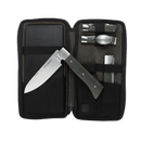 The Messermeister Adventure Chef Linen Summit Set - 6 Piece includes a chef’s knife, fork, tongs, peeler, and cutting board in a zippered black case—perfect for outdoor chefs and an ideal addition to any campfire cooking set.