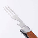 The Messermeister Adventure Chef Maple Folding Camp Utensil features a metal three-tine fork with a bottle opener and a wooden-finish handle—ideal for on-the-go chefs.