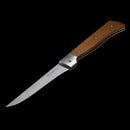 The Messermeister Adventure Chef Maple Folding Flexible Fillet Knife - 6" features a long, slim German stainless steel blade and a maple wood handle, shown open against a black background.
