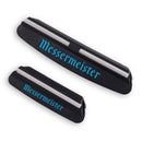 The Messermeister Sharpening Angle Guide Set - 2 Piece features black guides with white ceramic rods and blue Messermeister branding, in large and small sizes—perfect for achieving precise knife angles when using a whetstone.