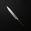 The Messermeister Avanta Forged Pro BBQ Knife Set - 6 Piece features high-carbon stainless steel chef’s knives with silver blades, oval indentations, and dark wooden handles with metal rivets—ideal for grill masters.