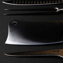 Close-up of three Messermeister Avanta Forged Pro BBQ Knife Set essentials: a serrated knife, meat fork, and high-carbon stainless steel cleaver—each tool featuring sharp, polished blades perfect for grill masters.