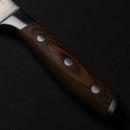 Close-up of a Messermeister Avanta Forged Pro BBQ Knife handle, featuring polished dark wood with three metal rivets, from Messermeister’s 6-piece high-carbon stainless steel set, resting on a black surface.