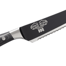 A close-up of the 10" Messermeister Avanta Kendrick BBQ Scalloped Brisket Knife, featuring a serrated German stainless steel blade with fists and "KERD BLACK BBQ" print, and a wooden handle. Brand: Messermeister.