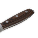 Close-up of the Messermeister Avanta Pakkawood Heavy Cleaver - 7" handle, crafted from dark pakkawood with visible grain and three rivets securing it to the stainless steel tang, shown against a white background.