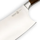 Close-up of the Messermeister Avanta Pakkawood Heavy Cleaver - 7" featuring a stainless steel blade engraved with the Messermeister logo and brand name, plus a pakkawood handle, set against a plain white background.
