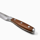 The Messermeister Avanta Smoked Teak Steak Knife Set (4 Piece) features high-carbon stainless steel blades and smoked teak wood handles with three metal rivets, displayed against a plain white background.