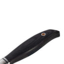 Close-up of the Messermeister Blacksmith Chef's Knife - 8" handle, made of dark wood with an ergonomic design and a metal rivet. The German stainless steel blade is partially visible on the left.