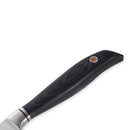 Close-up of the Messermeister Blacksmith Paring Knife - 3.5" handle, crafted from dark polished wood with a single metal rivet and smooth ergonomic shape; part of the precision blade is seen on the left.
