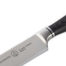 Close-up of a Messermeister Blacksmith Utility Knife - 6" with a wooden handle and shiny blade engraved with Messermeister branding. The German stainless steel knife appears clean and unused.