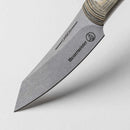 Close-up of the Messermeister Carbon Paring Knife - 3.5" with a pointed blade and patterned handle, set against a light background. Branding and text are visible on the high-carbon steel blade.
