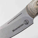 Close-up of the Messermeister Carbon Paring Knife - 3.5" blade with a wood-grain handle, featuring the Messermeister brand name, logo, and "CARBON" engraved on the high-carbon steel blade.