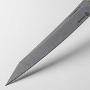 Close-up of the Messermeister Carbon Slicer - 9" with a sharp, pointed blade in gray matte finish. The brand logo is clearly visible on the carbon steel blade, set against a plain white background.
