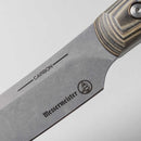 Close-up of the Messermeister Carbon Utility - 6" knife blade with a textured handle, featuring the Messermeister logo engraved on its high-carbon steel against a light background.