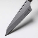 Close-up of the Messermeister Chef April Bloomfield Carbon Chef's Knife 6.5" blade, featuring the Messermeister brand name and logo engraved on the high-carbon steel, set against a plain white background.