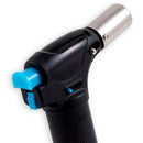 The Messermeister Cheflamme Mini Culinary Torch by Messermeister features a textured grip, metallic nozzle, and blue ignition and safety switches—ideal as a kitchen or brûlée torch.
