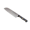 The Messermeister Custom Kullens Santoku Knife - 7" features a stainless steel blade with oval kullens indentations and a black ergonomic handle, displayed on a white background.