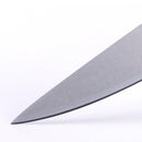 Close-up of the sharp tip of a stainless steel knife from the Messermeister Custom Next Level 5-Piece Magnetic Knife Block Set, set against a plain white background.